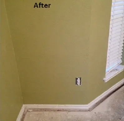 After: the same wall repaired and repainted