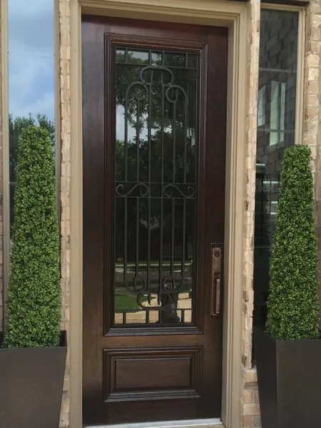 Front door with a dark stain finish